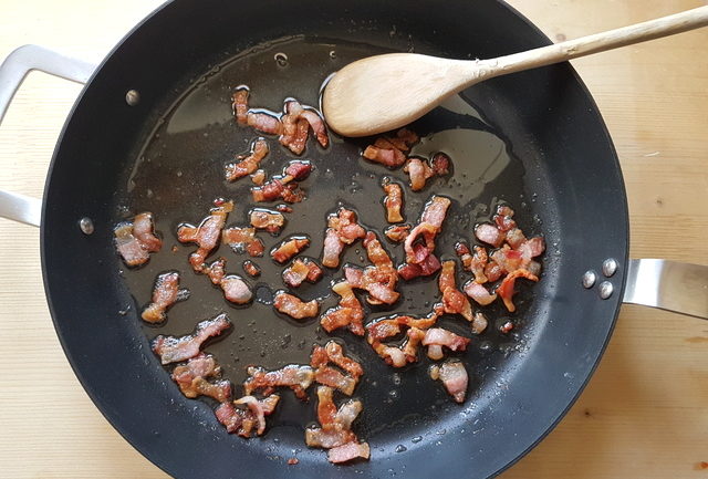 cooked guanciale pieces in frying pan