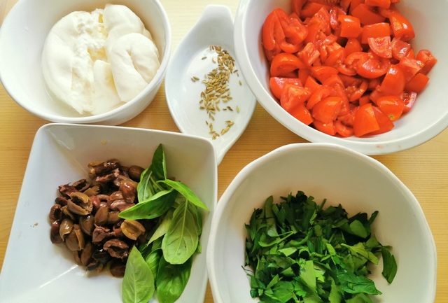 ingredients for spaghetti alla checca prepared for cooking.