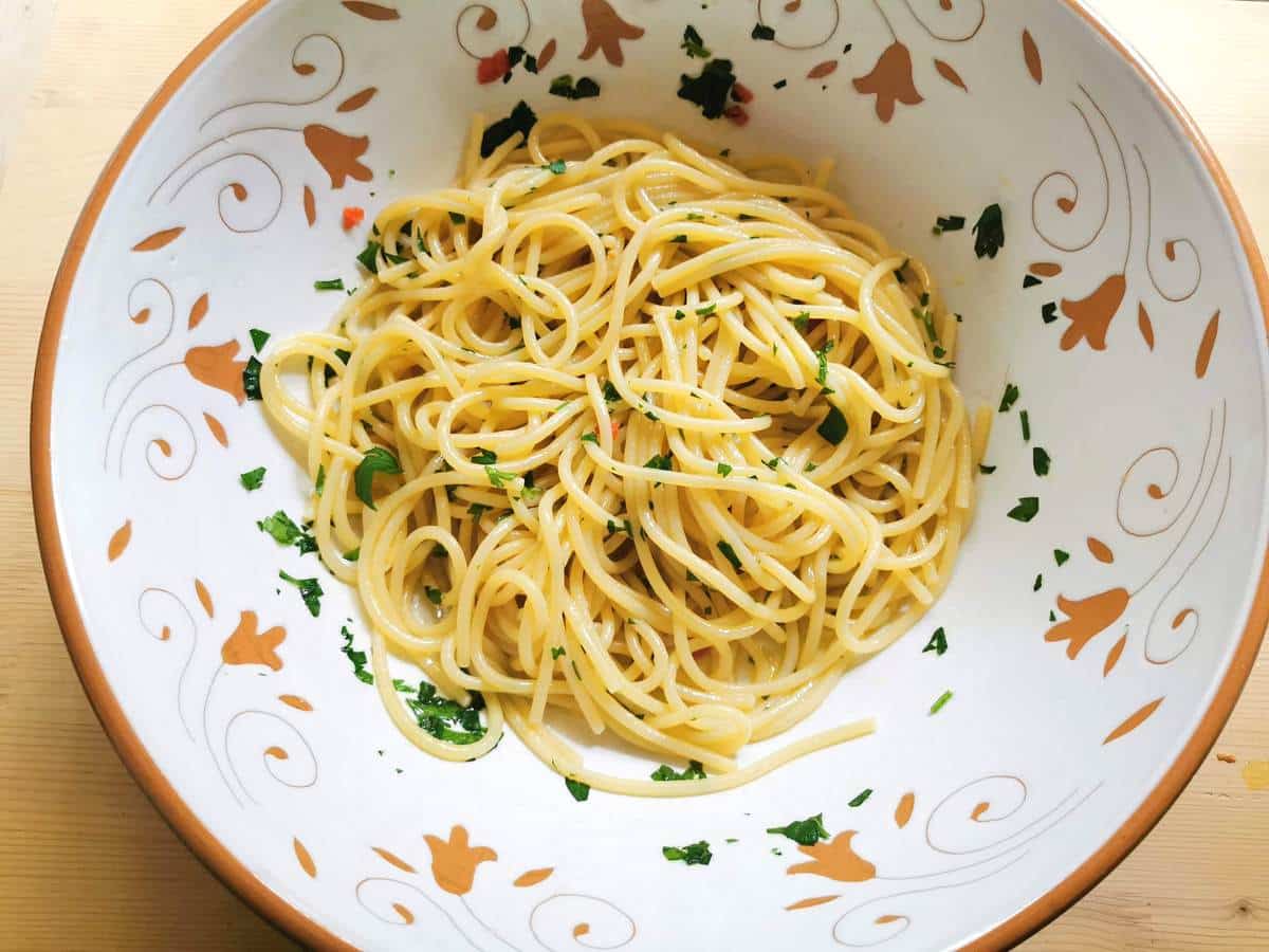 spaghetti alla colatura in large bowl