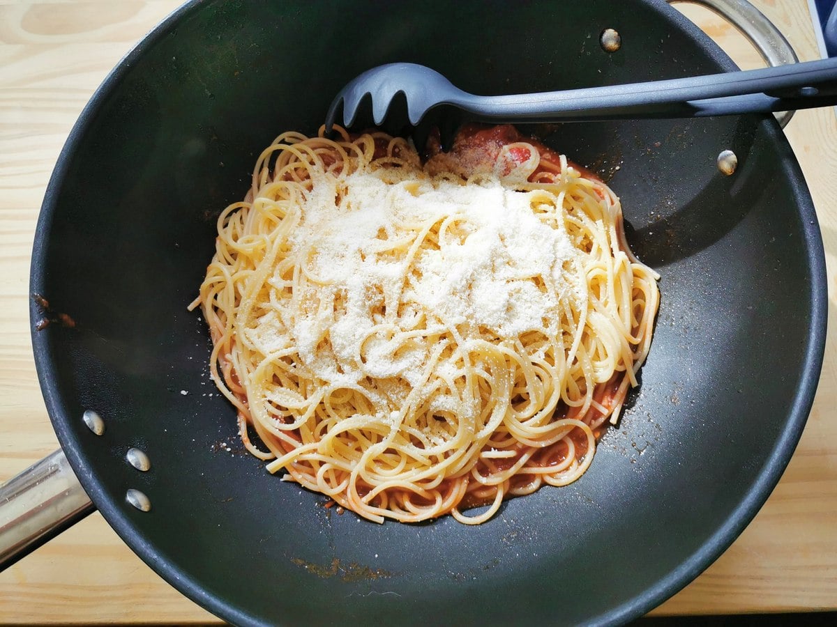 Pasta and Pecorino added to the amatriciana sauce.