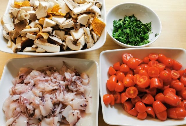 mushrooms, calamari, tomatoes and parsley cleaned and chopped