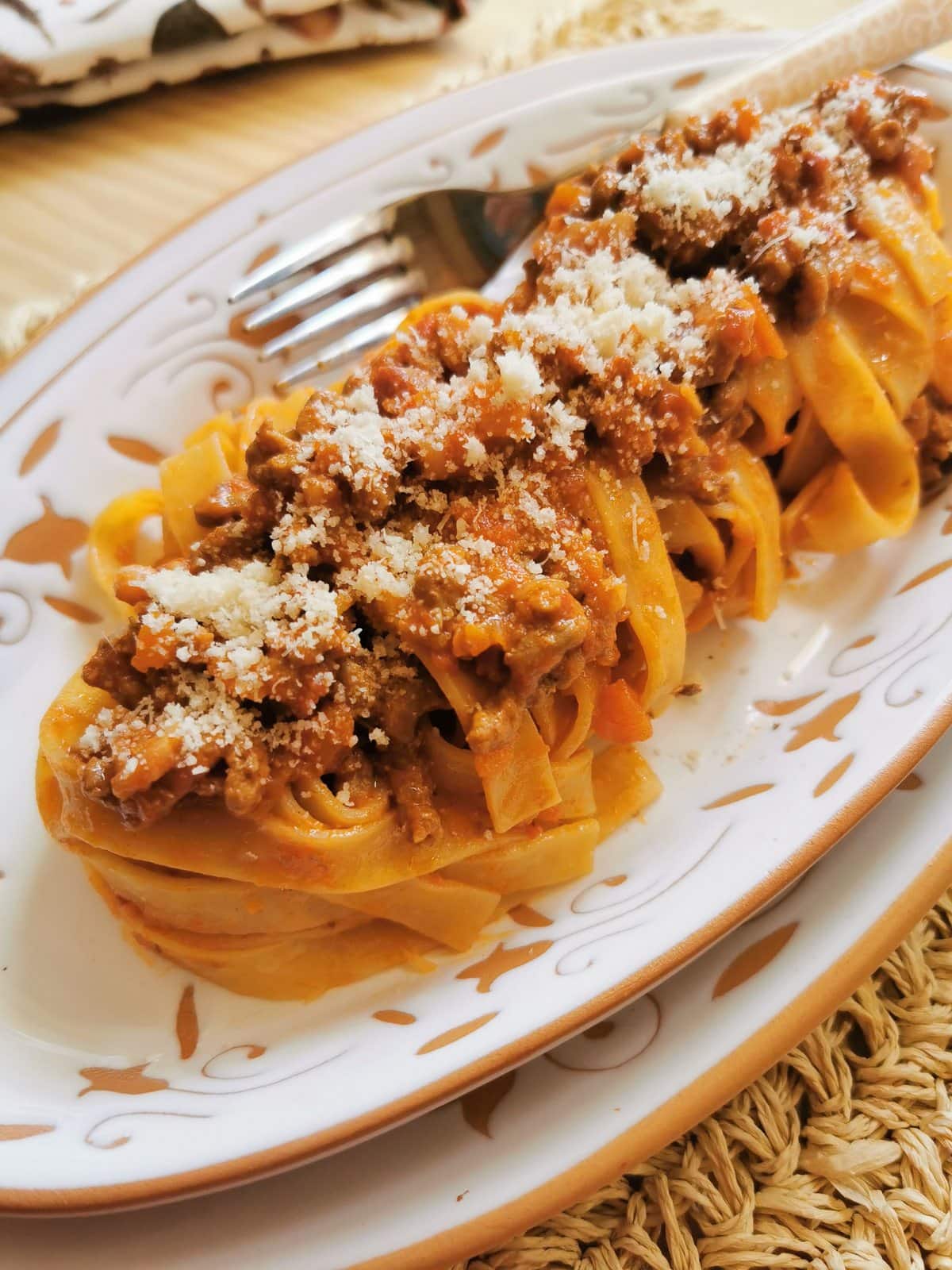 tagliatelle bolognese with parmigiano reggiano.