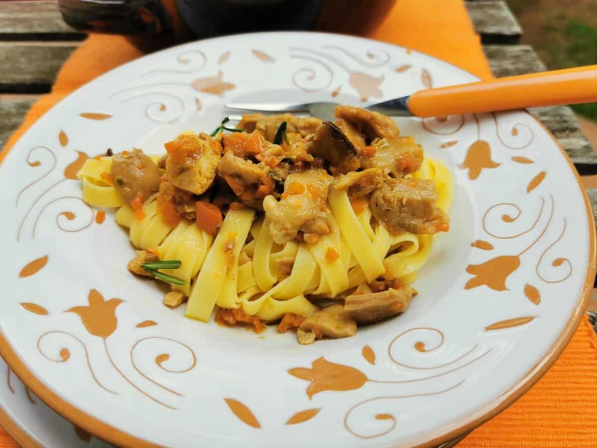 tagliatelle and rabbit ragu in a bowl