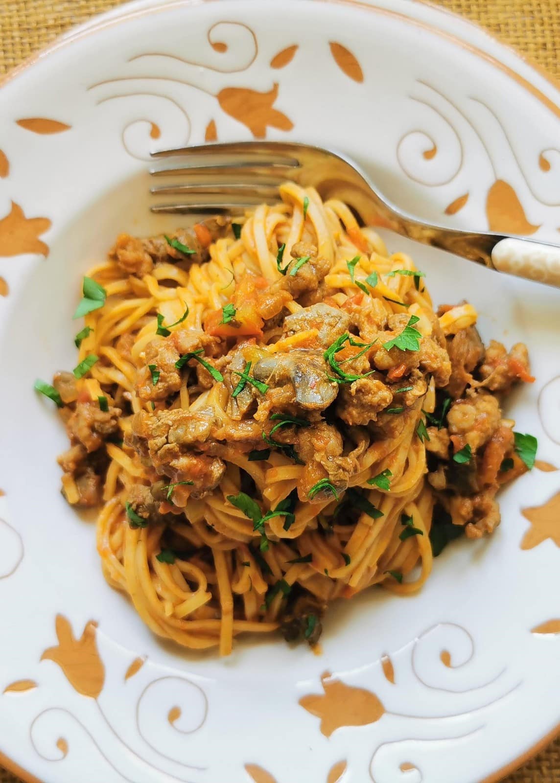 Tagliolini pasta alla Langarola in a bowl with a fork