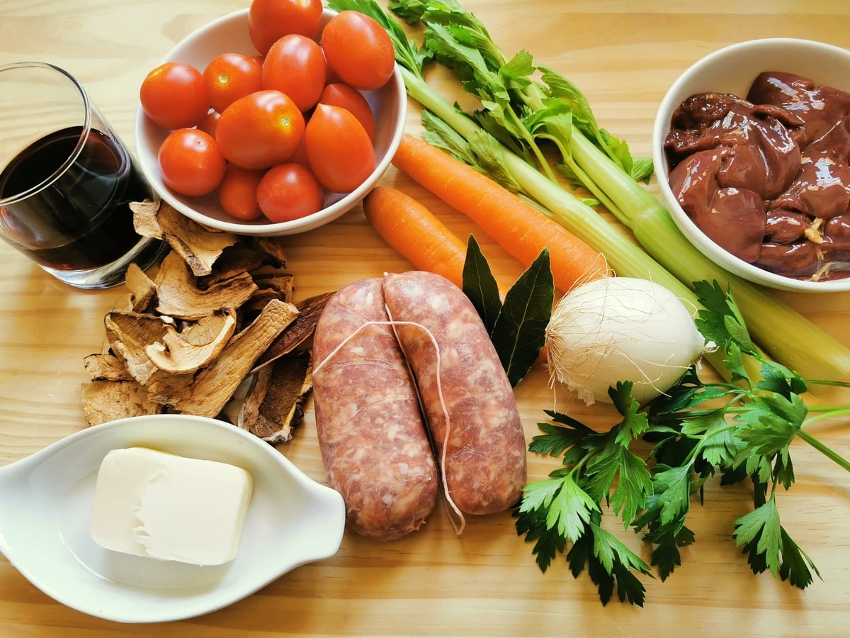 Tagliolini pasta alla Langarola ingredients on a wooden board