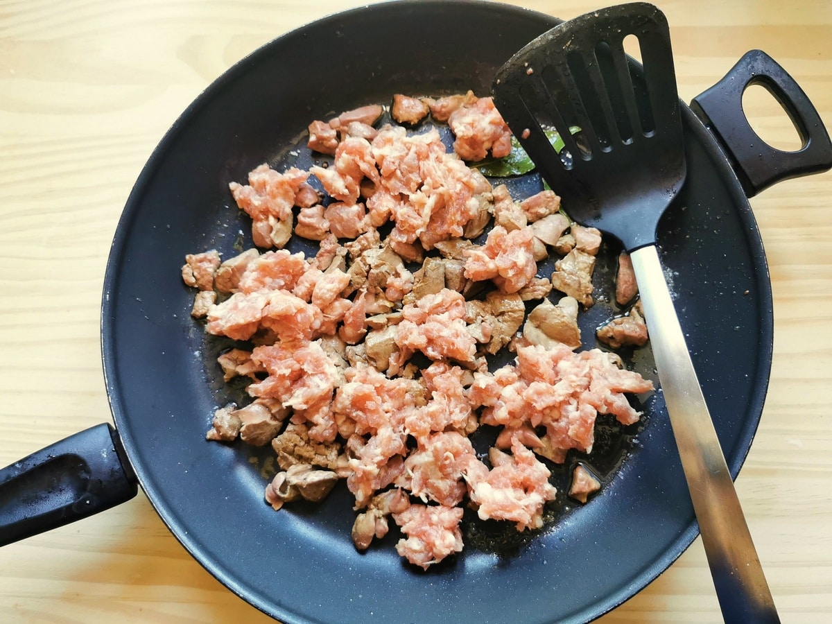 Italian sausage added to the pan