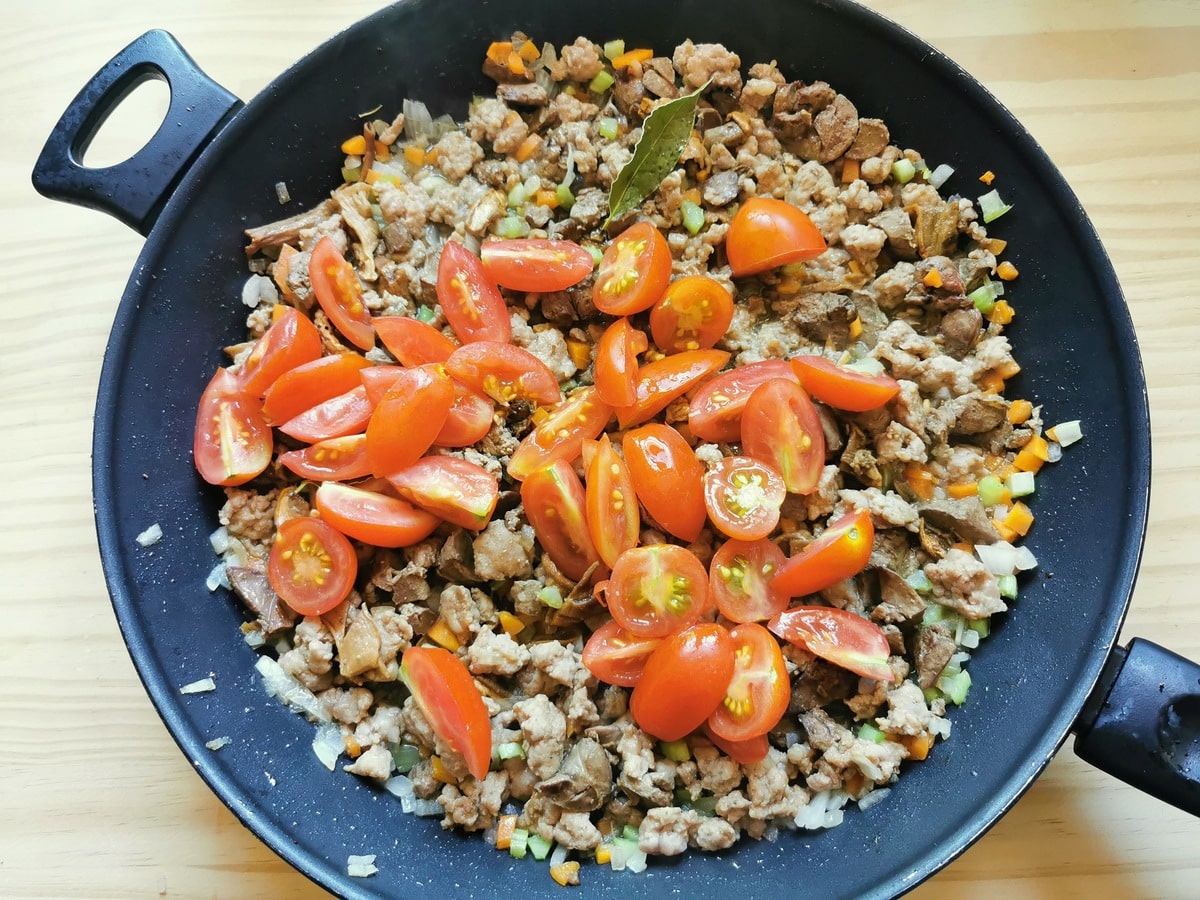 Cherry tomatoes added to the mixture