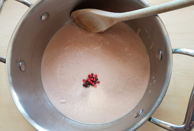 tuna and anchovy sauce with peppercorns in saucepan