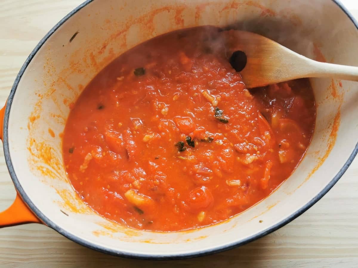 Italian lardo tomato sauce in Dutch oven